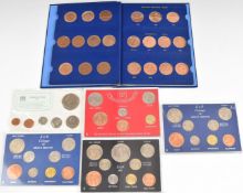 A collection of British pennies in Whitman folder, four pre-decimal sets in perspex presentation