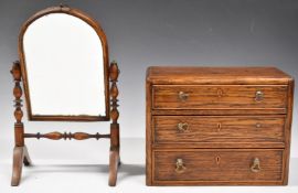 A 19thC oak apprentice chest of three graduated drawers with cockspur detail and inlaid escutcheons,