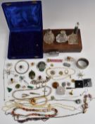 A collection of costume jewellery including silver necklace, agate necklace, spider brooches, 9ct