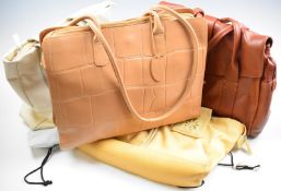 Four large Radley handbags, three with original dust bags, includes striped, faux croc and knotted