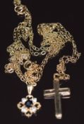 A 9ct gold pendant set with a sapphire and cubic zirconia and a cross pendant with two 9ct gold