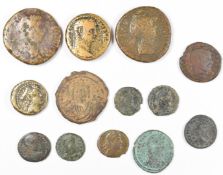 A collection of twelve Roman copper / bronze coins together with a Greek and Byzantine example,