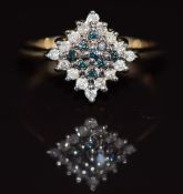 A 9ct gold ring set with blue diamonds surrounded by further diamonds in a square setting, 1.9g,