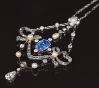 A c1900 18ct white gold necklace in a stylised bow design set with a natural Ceylon cornflower