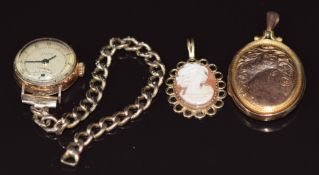 An 18ct gold cased watch, 9ct gold pendant set with a cameo, and a 9ct gold back and front locket
