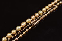 A single strand of cultured pearls with 9ct gold barrel clasp