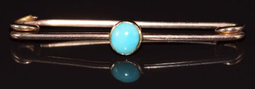 A 9ct rose gold brooch set with a turquoise cabochon, 2.1g 4.4cm