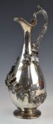 Victorian hallmarked silver wine or similar ewer or jug, with applied vine decoration, London