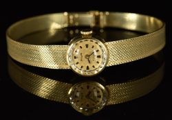 Orafa 14ct gold ladies wristwatch with black hands, two-tone hour markers, gold dial and 17 jewel