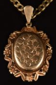 A 9ct gold locket with floral decoration, on 9ct gold curb link necklace / chain, 19.6g