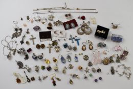 A collection of silver earrings and pendants, etc