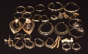 Fifteen pairs of 9ct gold earrings including hoop, rope twist etc and two single 9ct gold