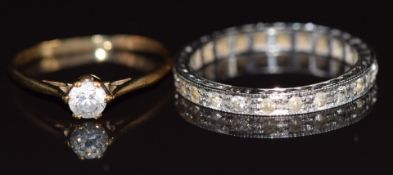 A 9ct white gold eternity ring and a 9ct gold ring, 3g, size P & L