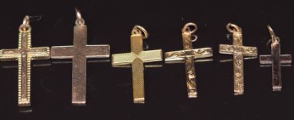 Six 9ct gold pendants in the form of crosses, three with engraved decoration, 5.7g