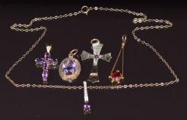 Five 9ct gold pendants most set with amethysts and one set with paste and a 9ct gold chain, 6.4g