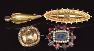 Two Victorian mourning brooches one set with foiled citrine (4g 2x1.7cm) and one with foiled garnets