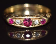 A c1900 18ct gold ring set with rubies and diamonds, 3.2g, size M