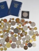 A quantity of overseas and UK coins including modern crowns, £5 examples, decimal sets, cased