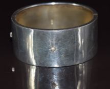 Hallmarked silver bangle/ cuff set with a split pearl, Birmingham 1885