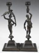 Pair of bronze figural candlesticks, one depicting a warrior with sword, height 25cm