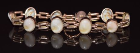 A 9ct rose gold bracelet set with shells, 12.5g 18.5cm