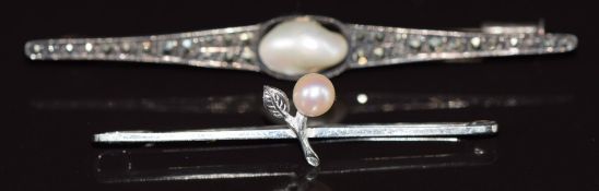 A 9ct white gold brooch set with a pearl (1.3g) and a silver brooch set with marcasite and a blister
