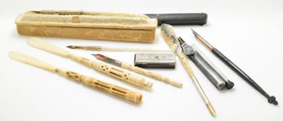 Seven various fountain and dip pens and propelling pencils, some bone with carved decoration and