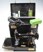 Singer 221K1 featherweight sewing machine, in original carry case with instructions, accessories,
