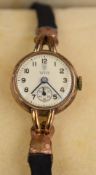Tudor 9ct gold ladies wristwatch with inset subsidiary seconds dial, blued hands, Arabic numerals,