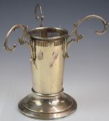 American silver epergne or centrepiece with three hanging loops surrounding a central vase holder,