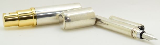 Modern feature hallmarked perfume spray bottle with pull off cap, height 8cm, together with a silver