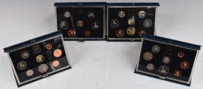 Four Royal Mint United Kingdom decimal proof coin sets 1983, 1984, 1985 and 1986, all in deluxe