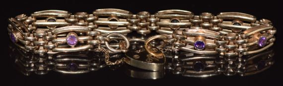 A 9ct gold gate bracelet set with amethysts, 16.2g 25cm