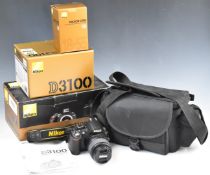 Nikon D3100 digital SLR camera with DX 18-55mm 1:3.5-5.6 lens, with original boxes