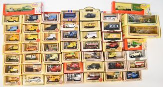 Over fifty Lledo Models of Days Gone diecast cars, delivery trucks etc, all in original boxes.