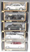 Five Maisto 1:18 scale diecast model cars to include Mercedes-Benz 500SL, Mini Cooper and Jaguar X-