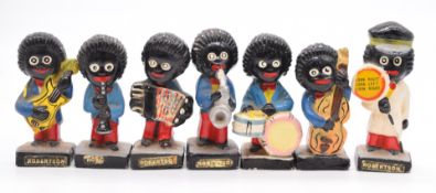 Seven various Robertson's Jam Golly advertising figures, most band members but one for the Green
