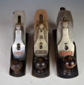 Set of three Record woodworking smoothing planes comprising No 04 1/2, 04 and 03