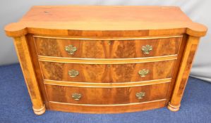 Mahogany bow fronted chest modelled as a chest of drawers, having lift up lid, W133 x D49 x H80cm