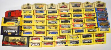 Approximately 60 diecast model cars to include Maisto, Shell collection, Polistil and Lledo.