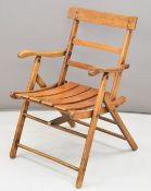 Victorian folding garden or similar chair, with brass plaque verso for Royal Letters Patent April