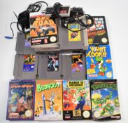 Nintendo Entertainment System NES together with two controllers and 12 games including Super Mario