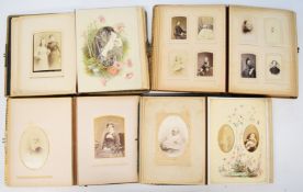 Four 19th or early 20thC albums of studio portraits, one dated 1882, including Hudson & Co.