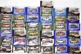 Thirty-five Corgi 1:36 scale diecast model Minis including Mini 7 Racing Club and Mini Mania ranges,