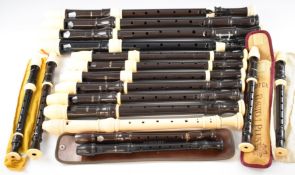 Seventeen recorders of various sizes, mostly Yamaha and Aulos examples
