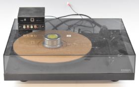 Rega Planar 3 record player / turntable, with two Rega 'Fono Mini A2D' USB pre-amp boxes.