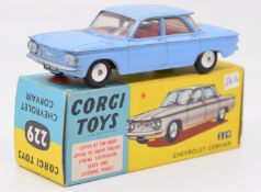 Corgi Toys diecast model Chevrolet Corvair with pale blue body, red interior and sliver hubs, 229,