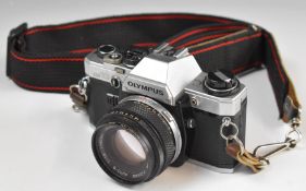 Olympus OM10 35mm SLR camera, fitted with 50mm 1:1.8 lens