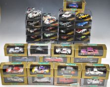 Thirty-five Vitesse 1:43 scale diecast model sports and racing cars to include Morgan 4/4 Serie II