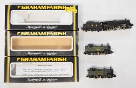 Three Graham Farish N gauge model railway locomotives LMS Black Five and two SR 0-6-0 tanks, all